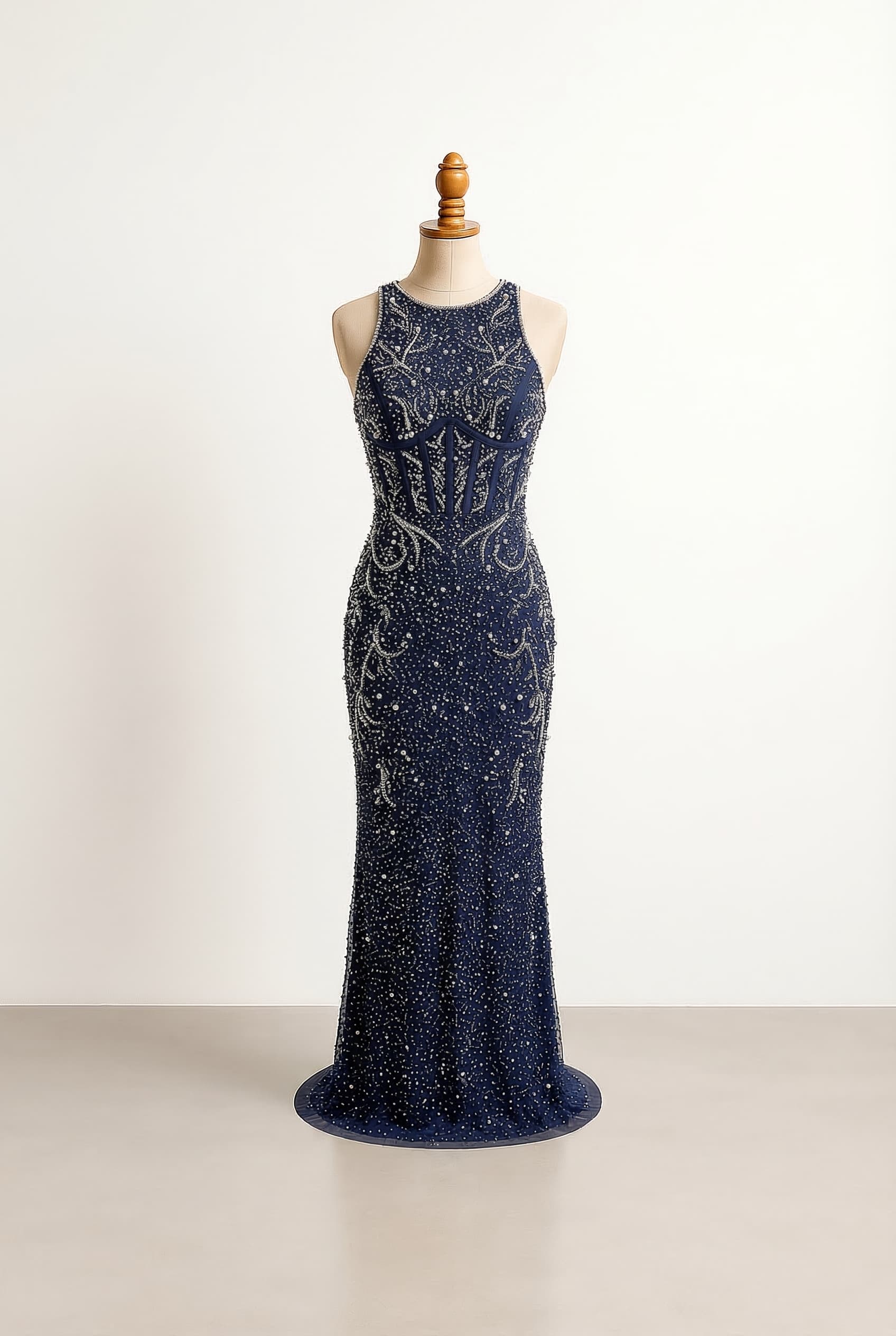 Navy blue maxi dress with silver shimmer and a corset-esque front detail not from sequins and a lower neckline