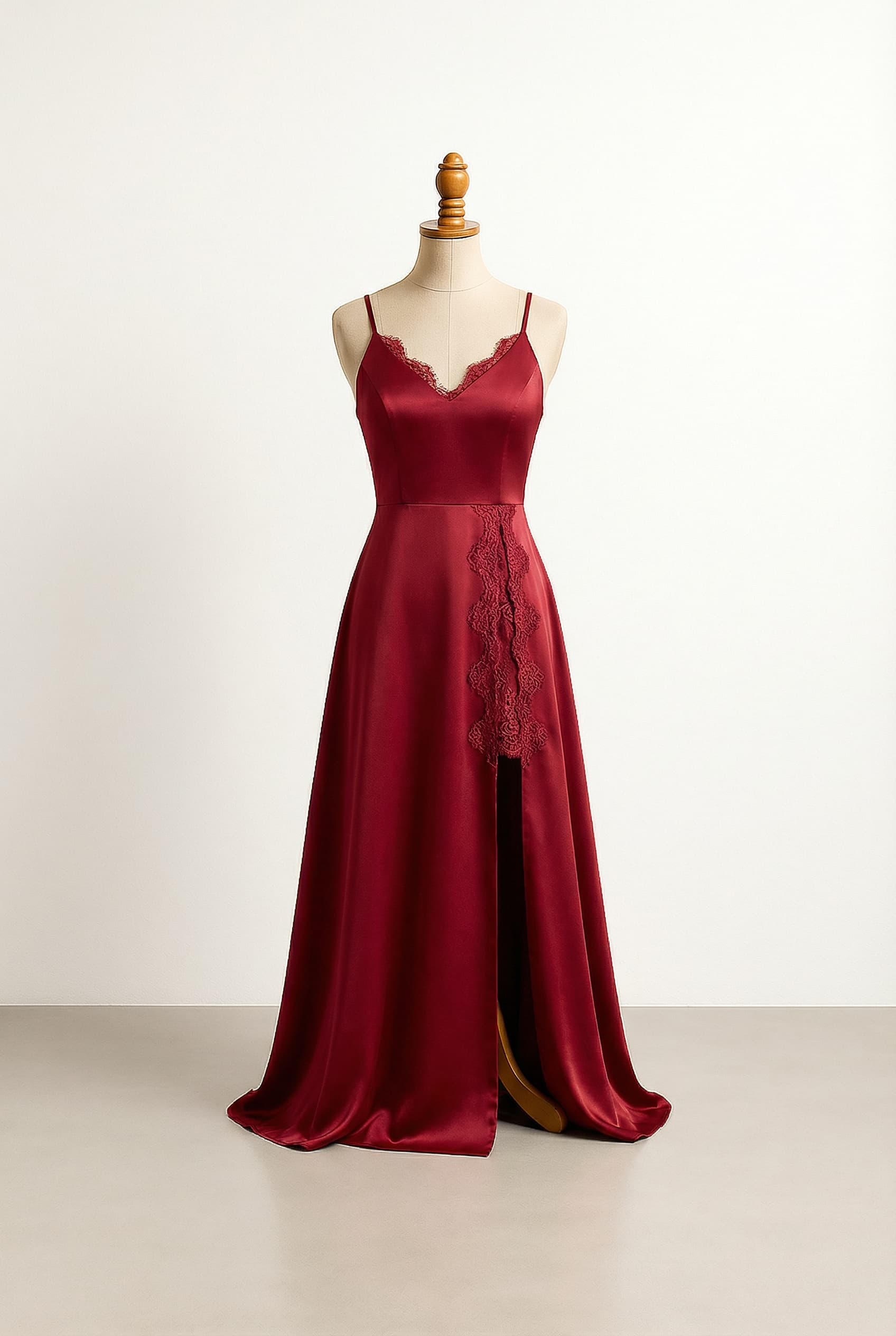 Glamorous red Duchess Satin prom dress with a V-neck, thigh-high slit, and integrated lace details.