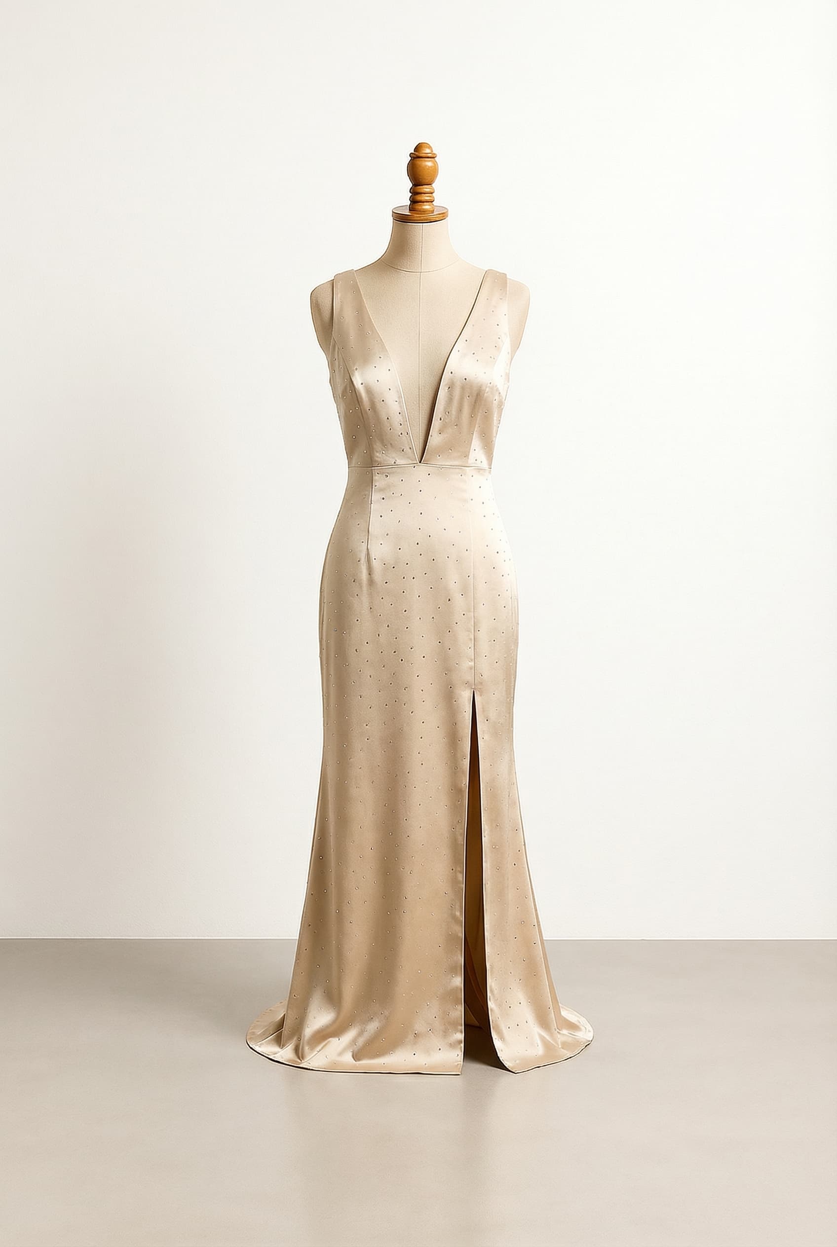 Sleek silk dress with a incredibly high split and sparkles and a deep dramatic V-neck sleeveless and floor length