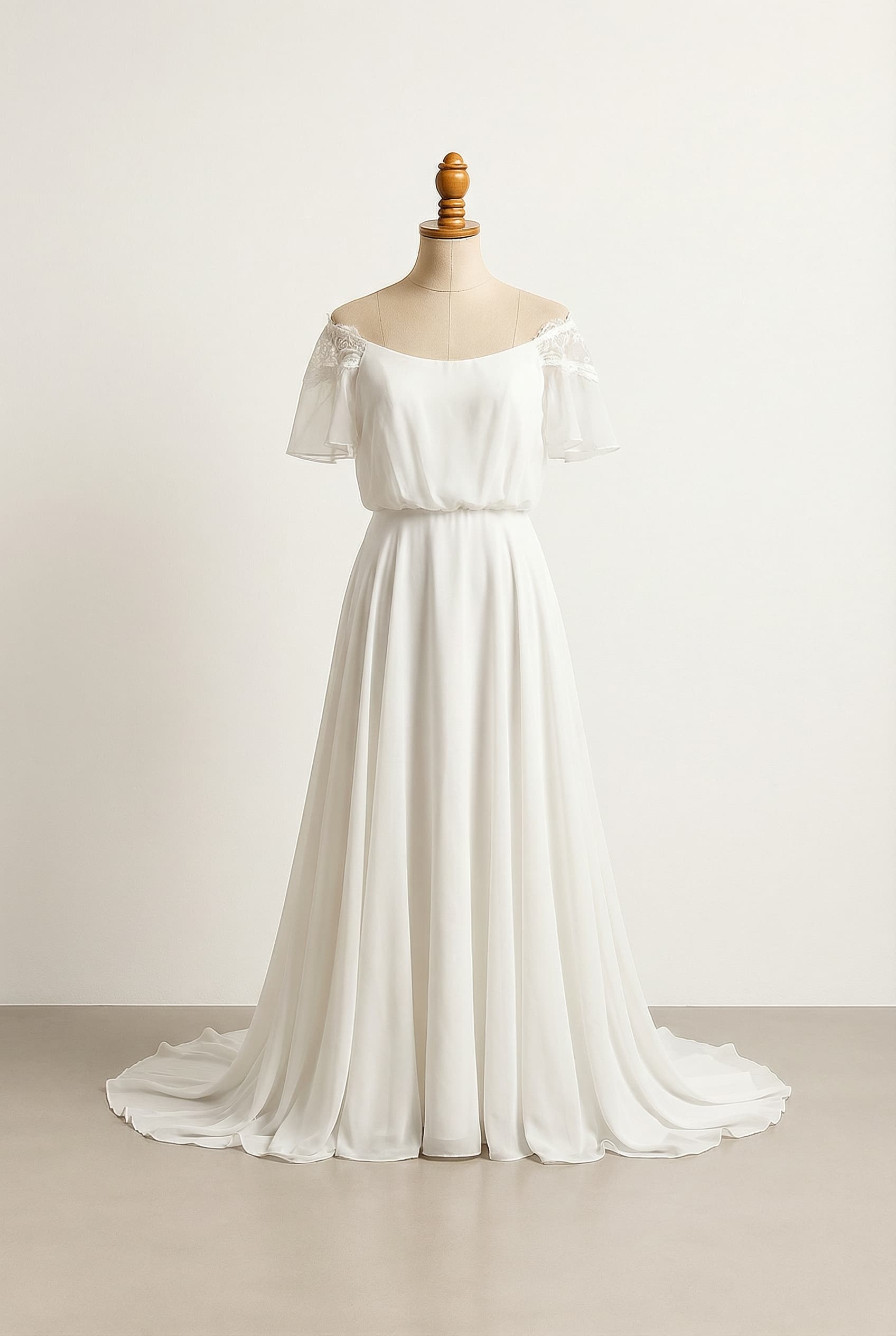 A romantic wedding dress with elegant details, featuring an off-shoulder neckline and a choice between cap sleeves or straps.