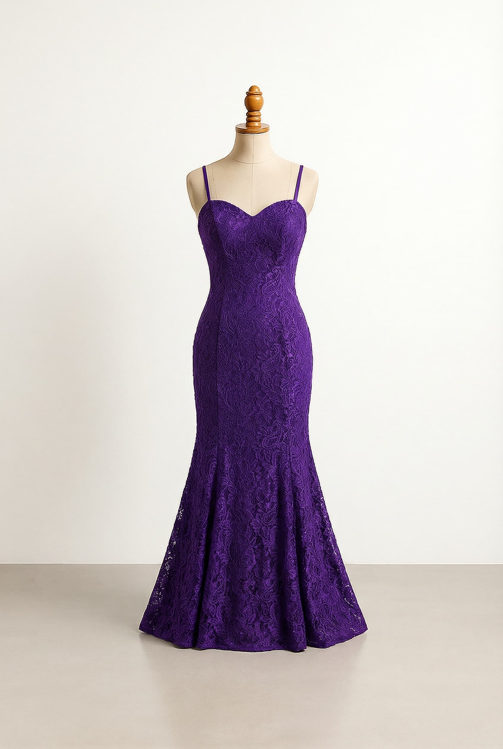 Glamorous royal purple prom dress with delicate spaghetti straps, a classic sweetheart neckline, a shimmering sequined bodice, and a full lace Trumpet skirt.