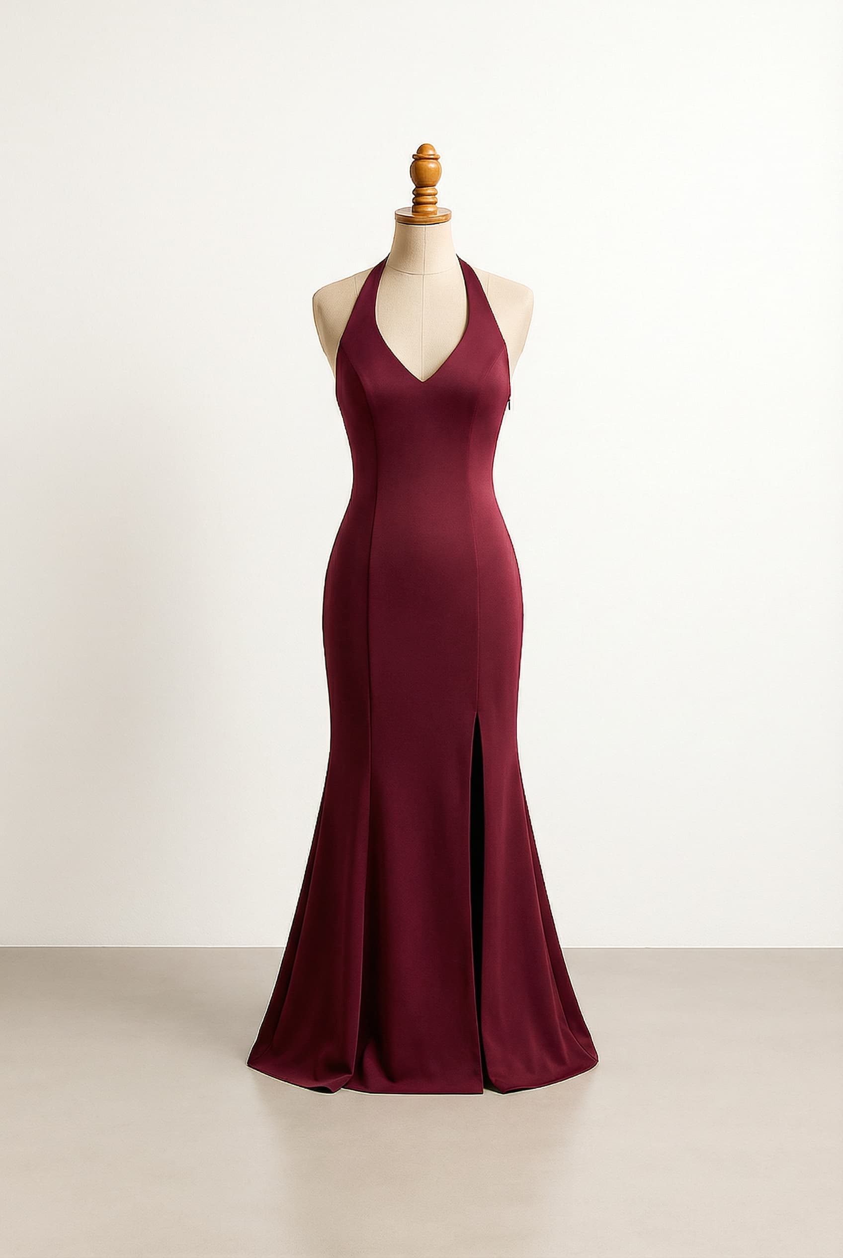 I want a balanced formal dress, mermaid fitted, split down my left leg, low v neck with halter neck and low back, side zip, burgandy, floor length