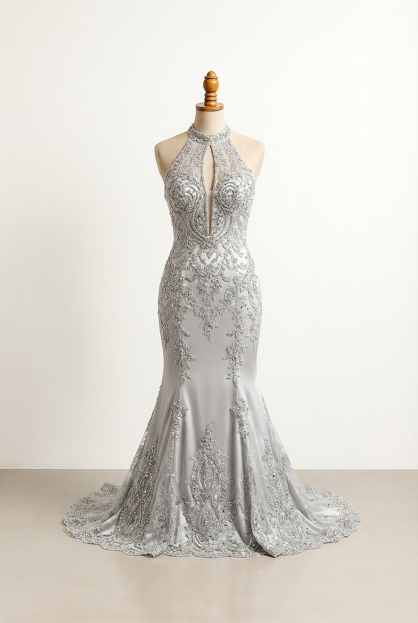 I want a balanced wedding dress I want it to be super tight mermaid style with some lace and bling with a halter neckline with a split in-between the boobs, I want the color to be silver