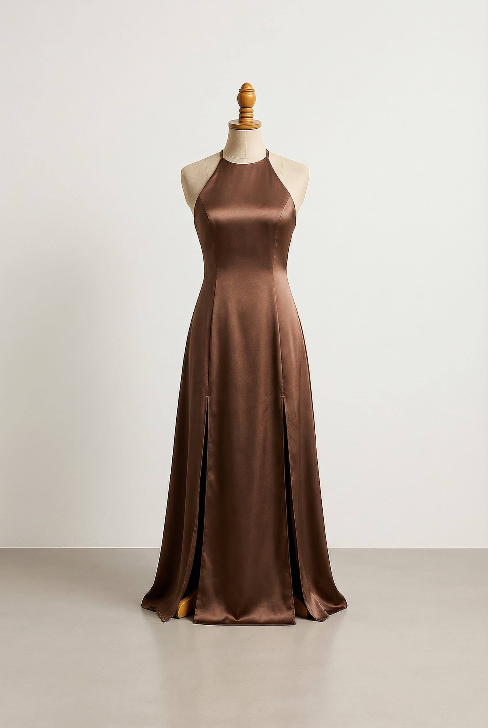 Glamorous prom dress with shimmering accents, featuring a flowing A-line silhouette with two high slits, a square halter neckline, and medium-width halter straps.