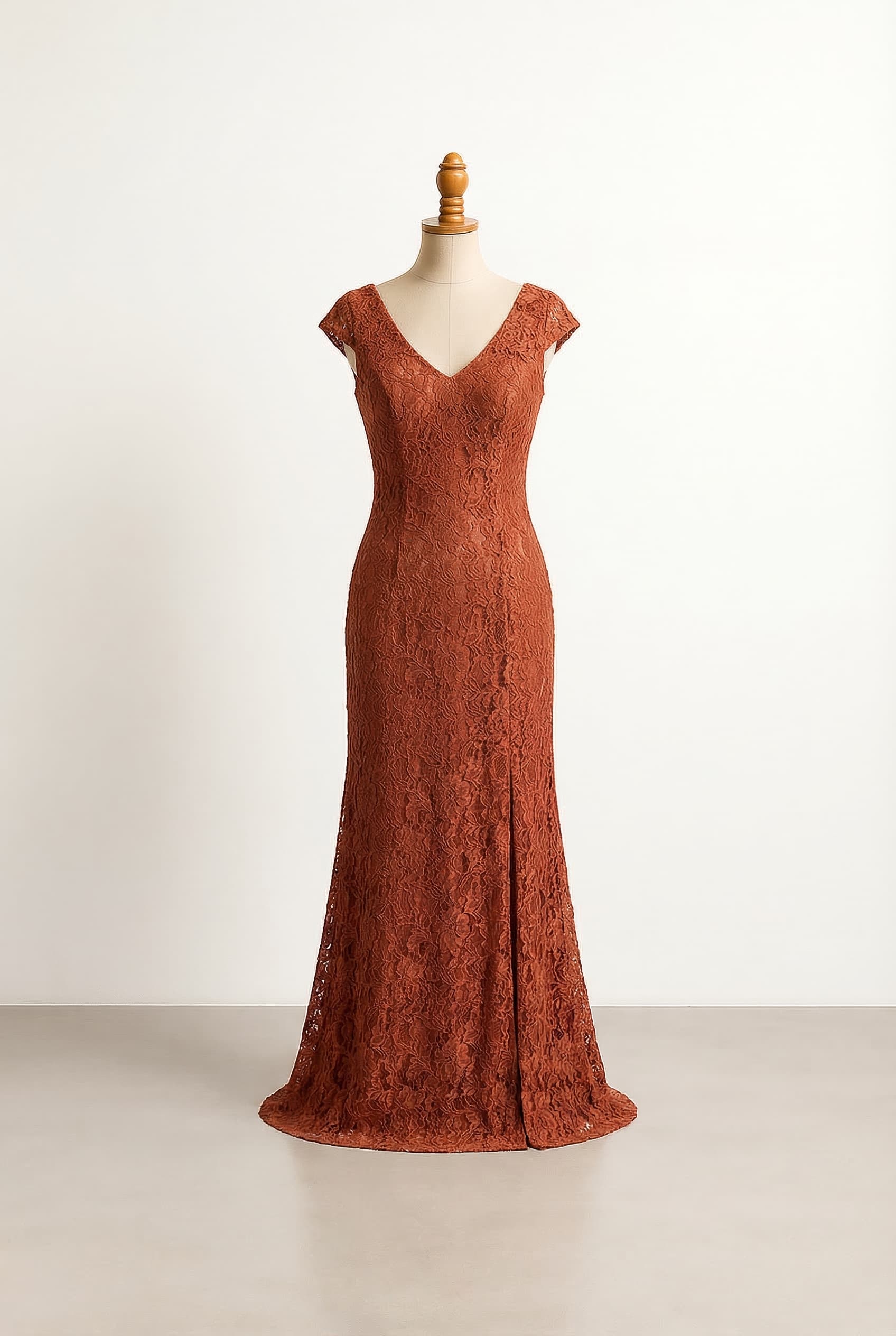 Rust colored dress with lace cap sleeve long and elegant with a slit and Alencon lace and a V-neckline