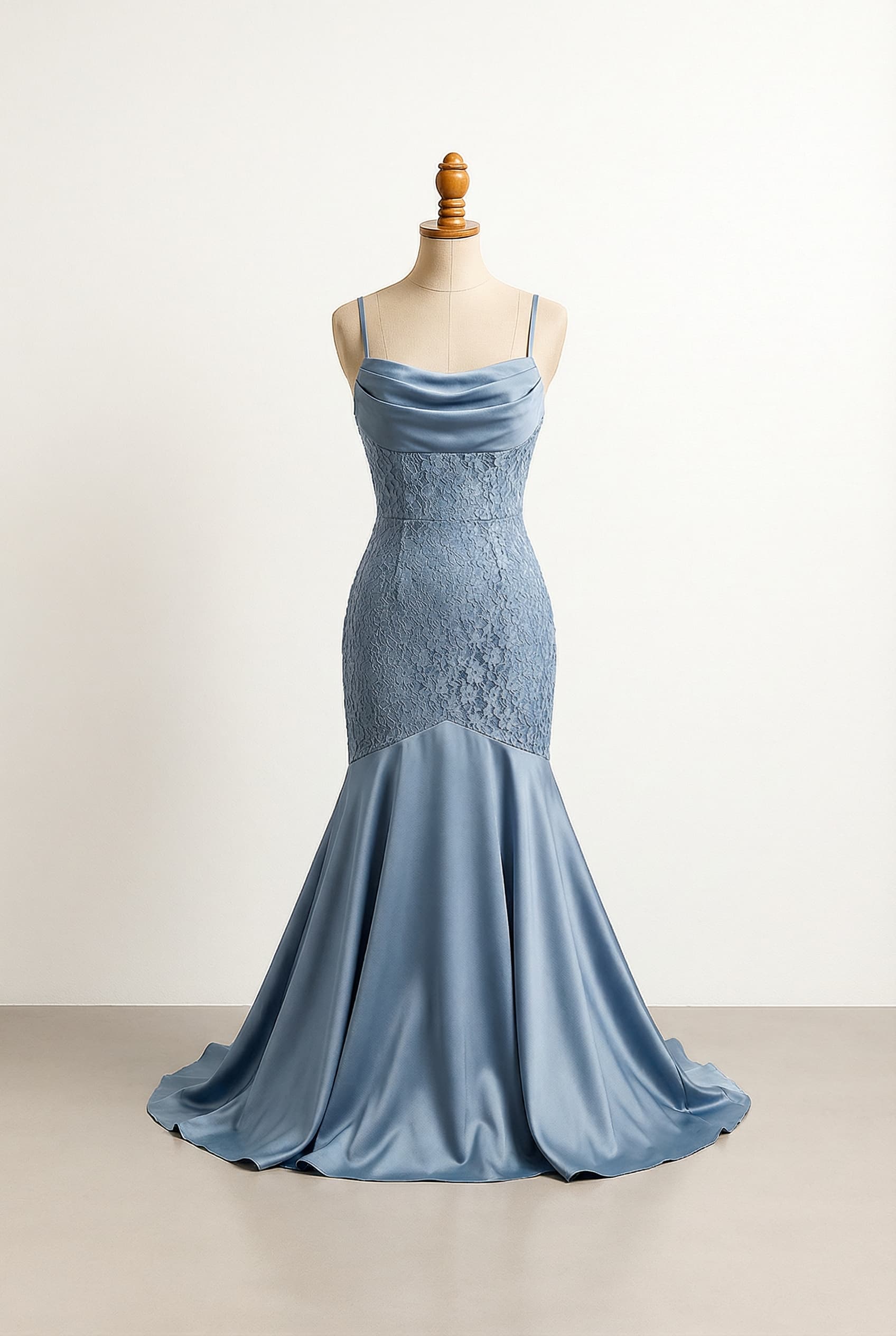 Glamorous prom dress with basque waist, spaghetti straps, a draped neckline, and a Mermaid silhouette, featuring a Duchess Satin skirt and a lace front with a small floral pattern, in a very delicate, pale pink.