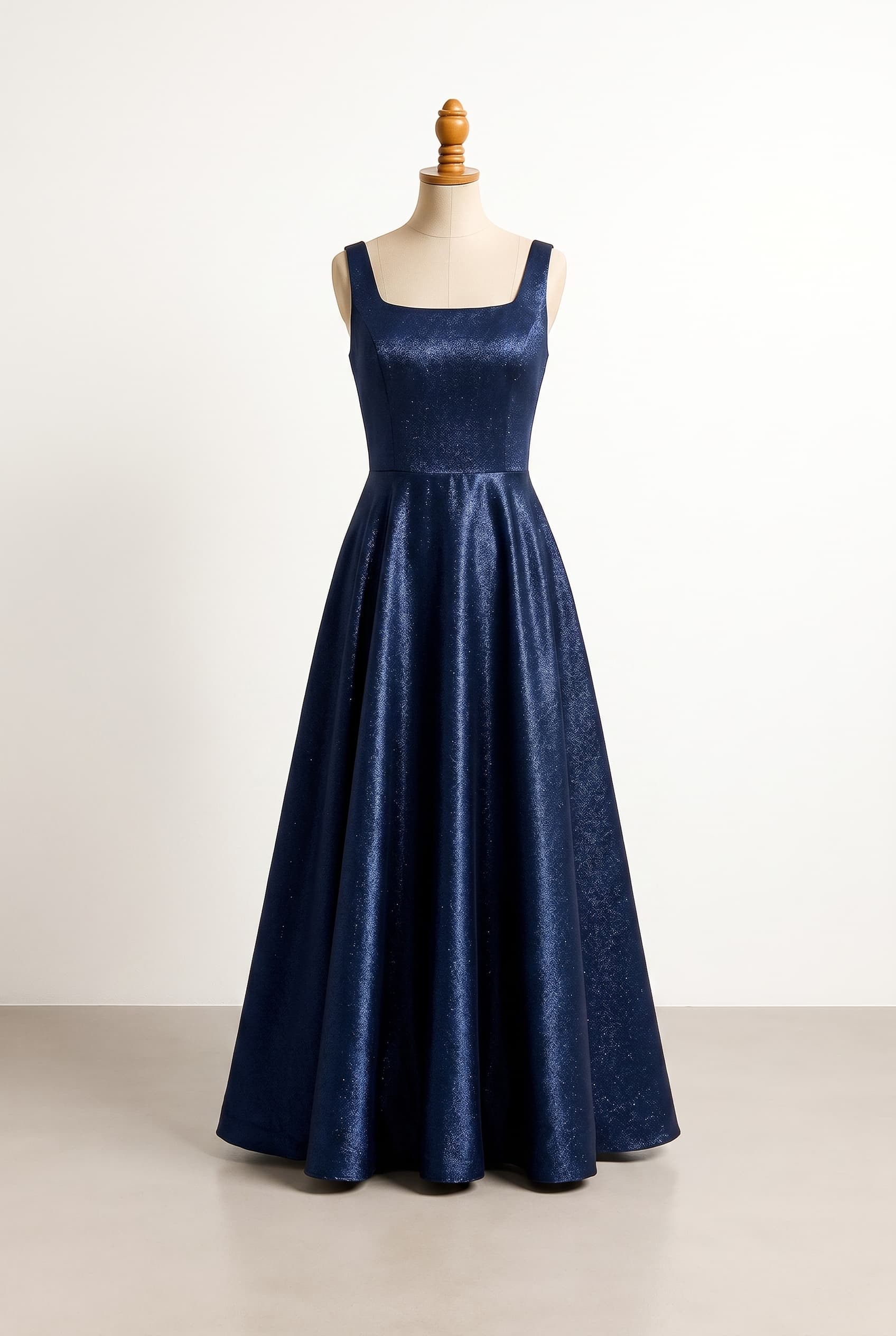 Balanced prom dress in midnight blue, square neckline, sleeveless, sparkly gown, no mermaid silhouette, flowy A-line silhouette, Duchess Satin fabric