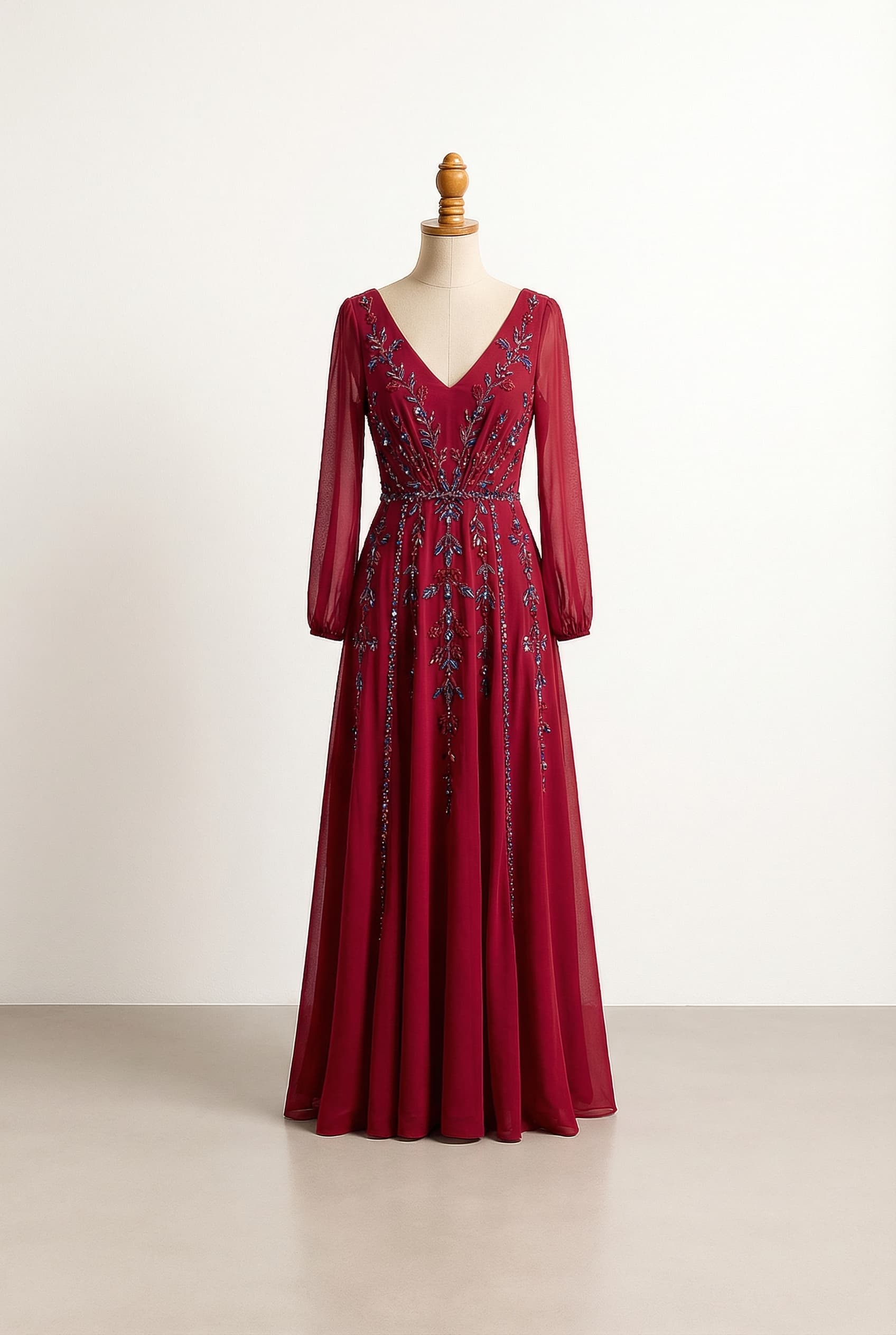 A romantic wedding dress with elegant details and long diamonds in blue and red