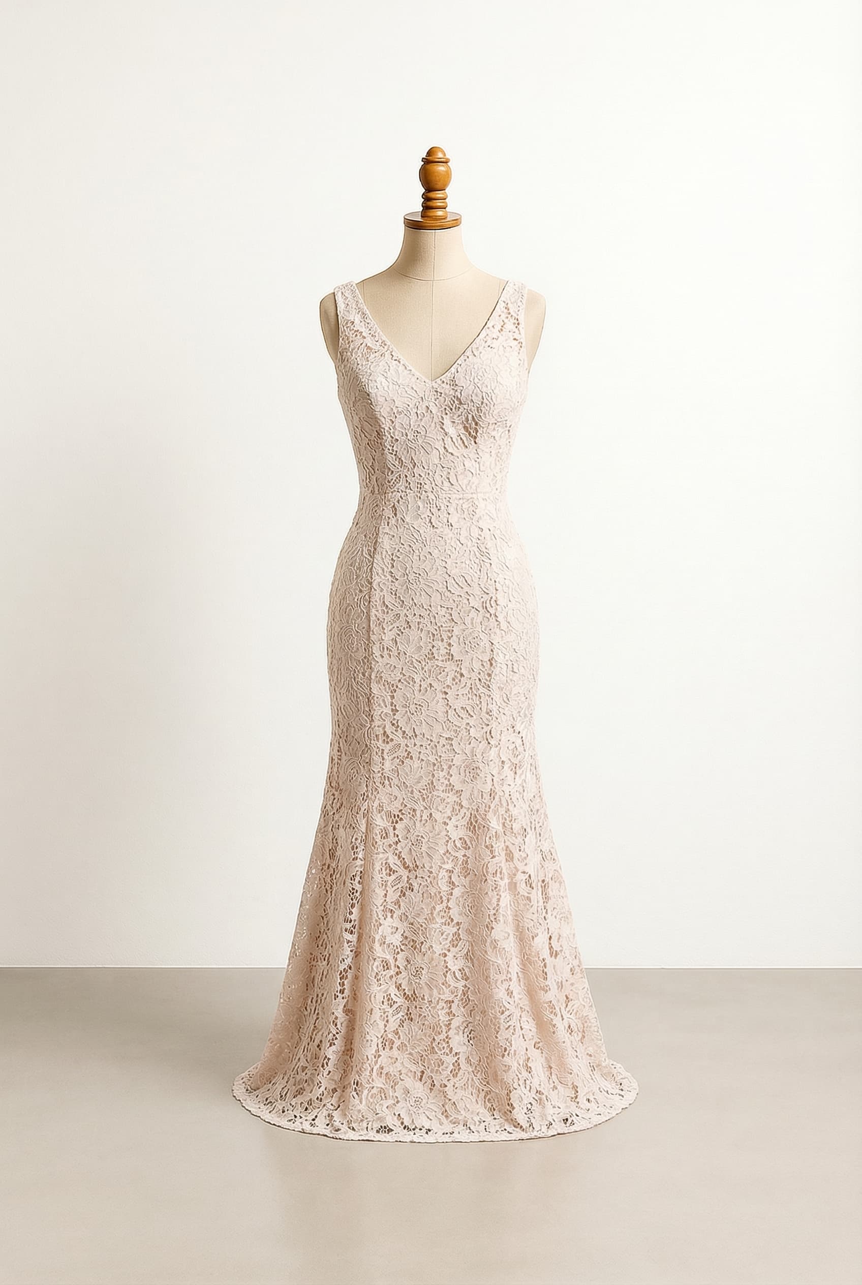 I want a balanced wedding dress with 3/4 length sleeves, an empire waist, and a high neckline. It should drape elegantly.
