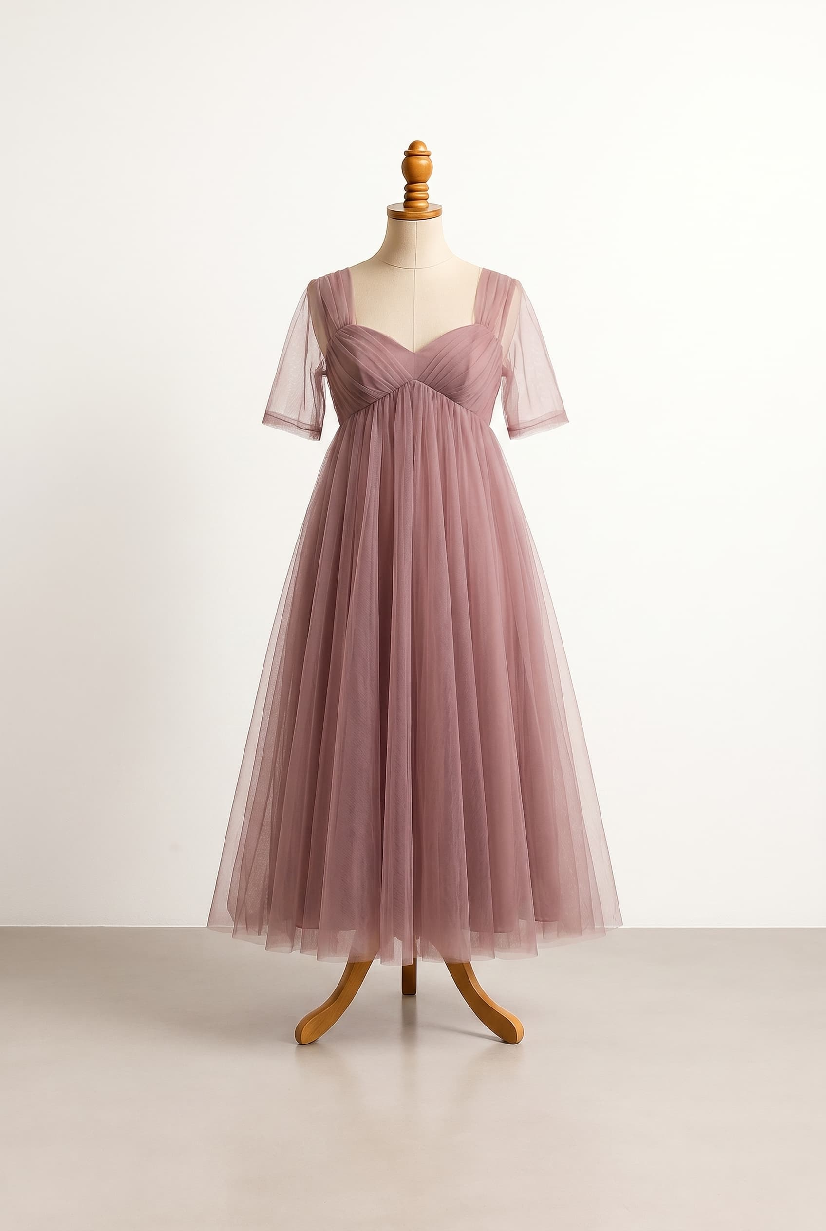A romantic, effortless bridesmaid vibe with a soft texture. Designed for comfort during an outdoor ceremony, prioritizing airy fabric and a balanced, modest neckline. Focus on a feminine, dreamy impression.
