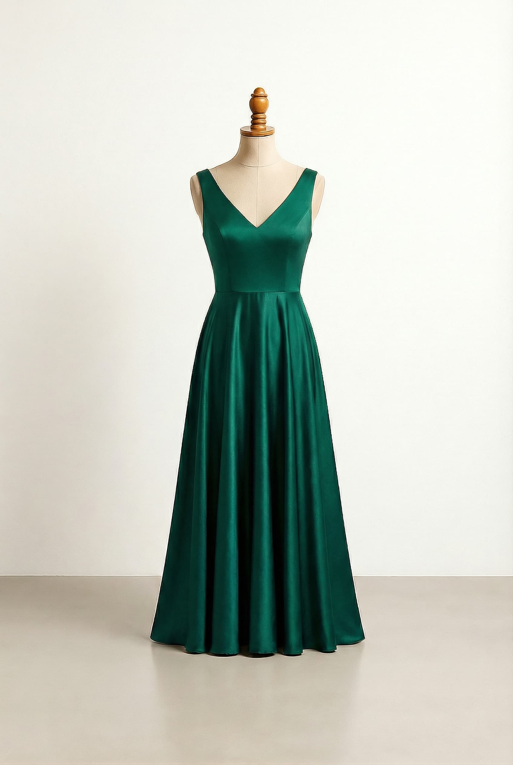 A prom dress in emerald green; Try V-neckline