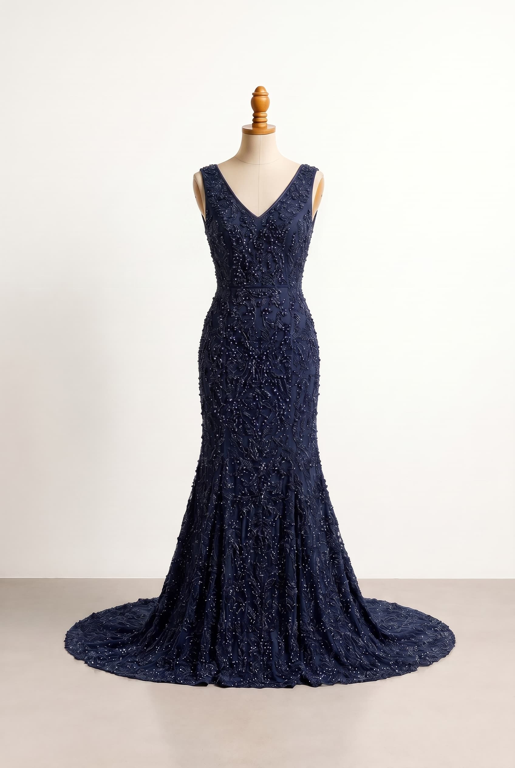 A dramatic entrance wedding dress with a focus on high-impact texture and elegant structure. Balanced coverage that maintains a formal, upscale impression. Designed for a grand venue where the dress creates a memorable silhouette, in Midnight Navy. Comfort boundary: no tight or clingy fit. Sleeves removed or changed from original design.