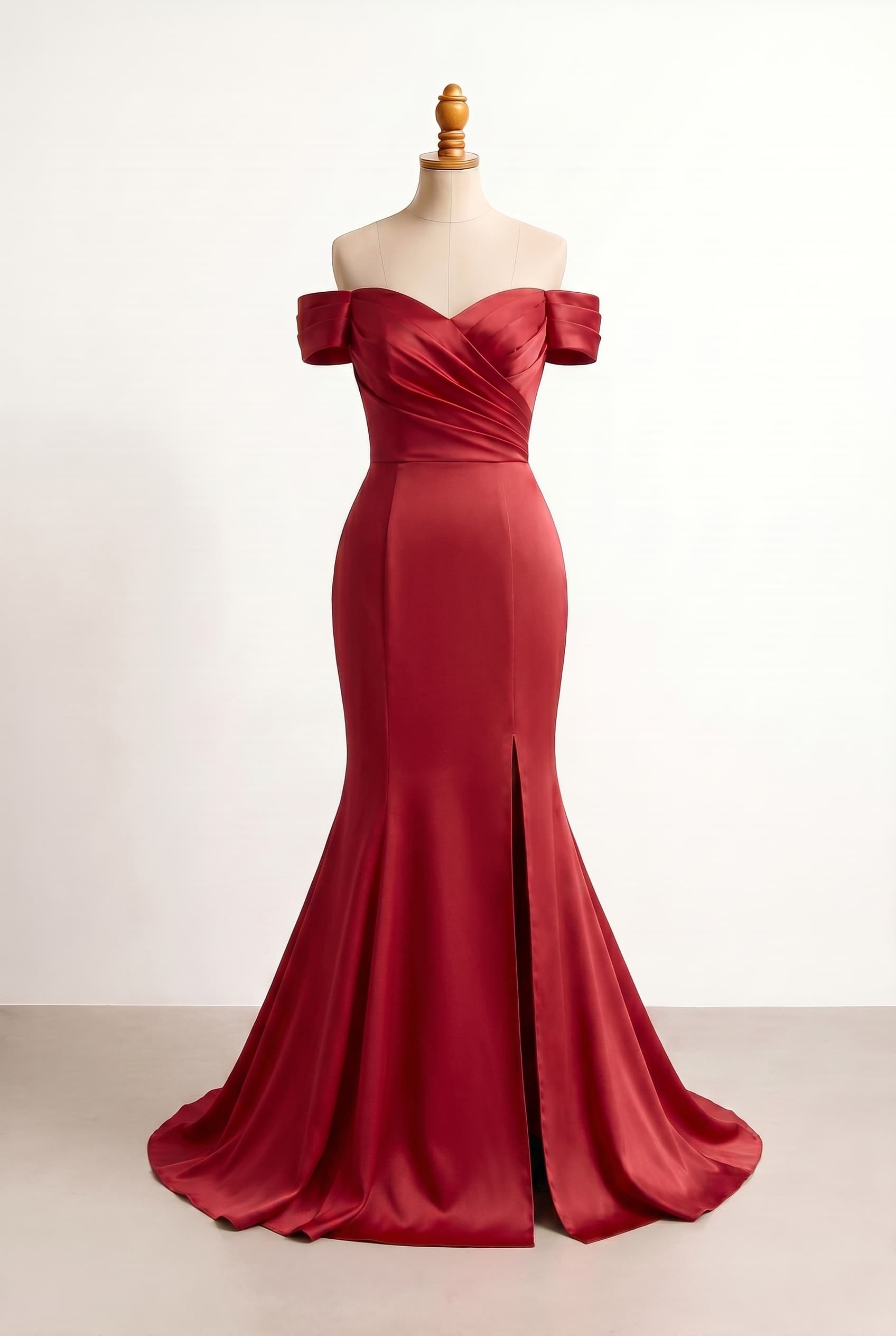An ethereal, romantic bridesmaid look that feels soft, effortless for a garden or outdoor ceremony, featuring a balanced cut that ensures ease of movement without being overly revealing, in candy apple red, with an off-shoulder neckline, front leg slit, smooth silky texture fabric, and cap/cuff sleeves. The dress style is a mermaid silhouette.