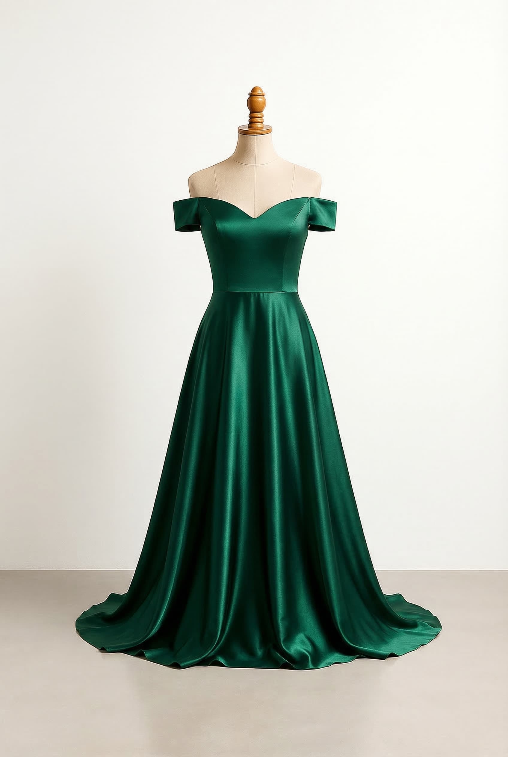 I want a balanced prom dress in dark emerald green, very fluid