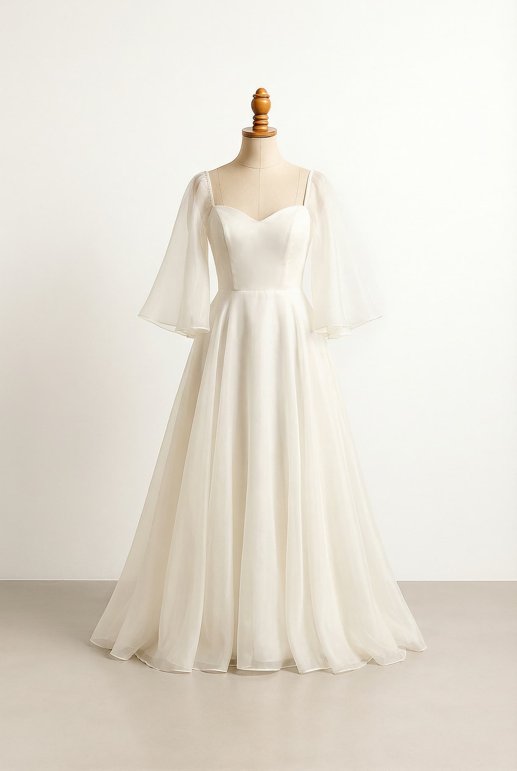 A romantic wedding dress with elegant details, adorned with floral lace and a flowy skirt
