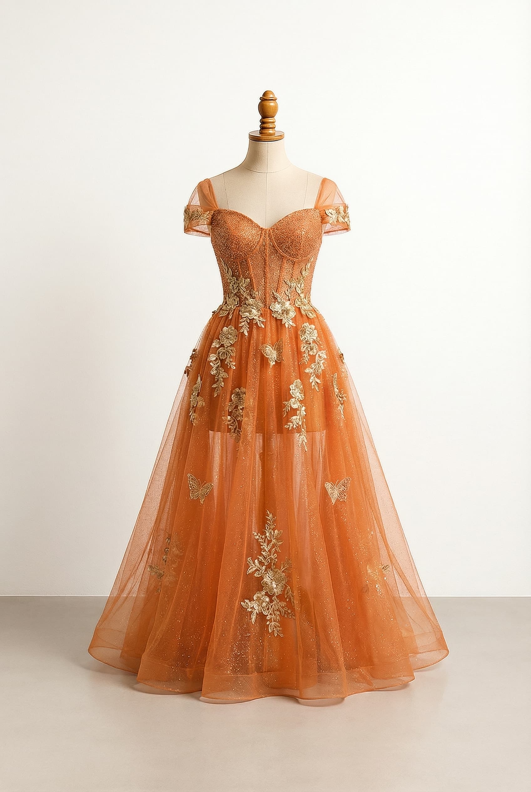 Orange dress with gold flowers and butterflies sparkly corset top off-the-shoulder neckline sleeves with gold pearls and very sparkly
