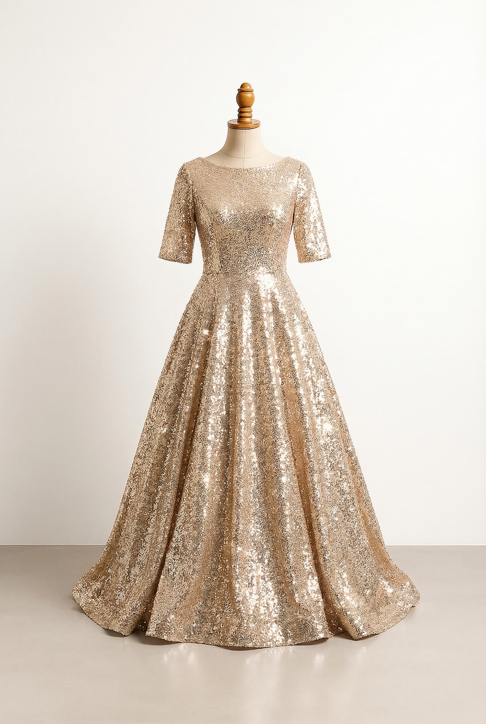 Strapless emerald green dress with gold sequin embellishment and a sweetheart neckline. More voluminous skirt.