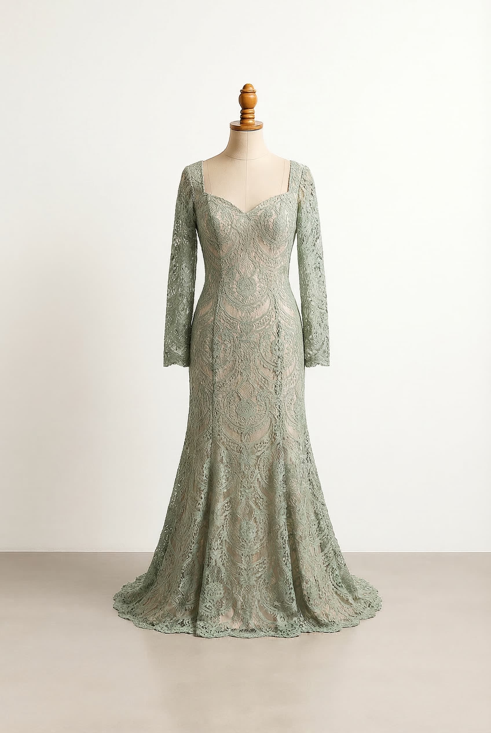 Modern and flowy wedding dress in Sage Green, Floor - Just reaches the floor, Long - Full length, Sweetheart - Heart-shaped curved neckline, Fit & Flare - Fitted through the waist and hips, then gently flares out, Lace - Intricate openwork patterns in various weights and designs. Silhouette: A-line, Fabric: Tulle.