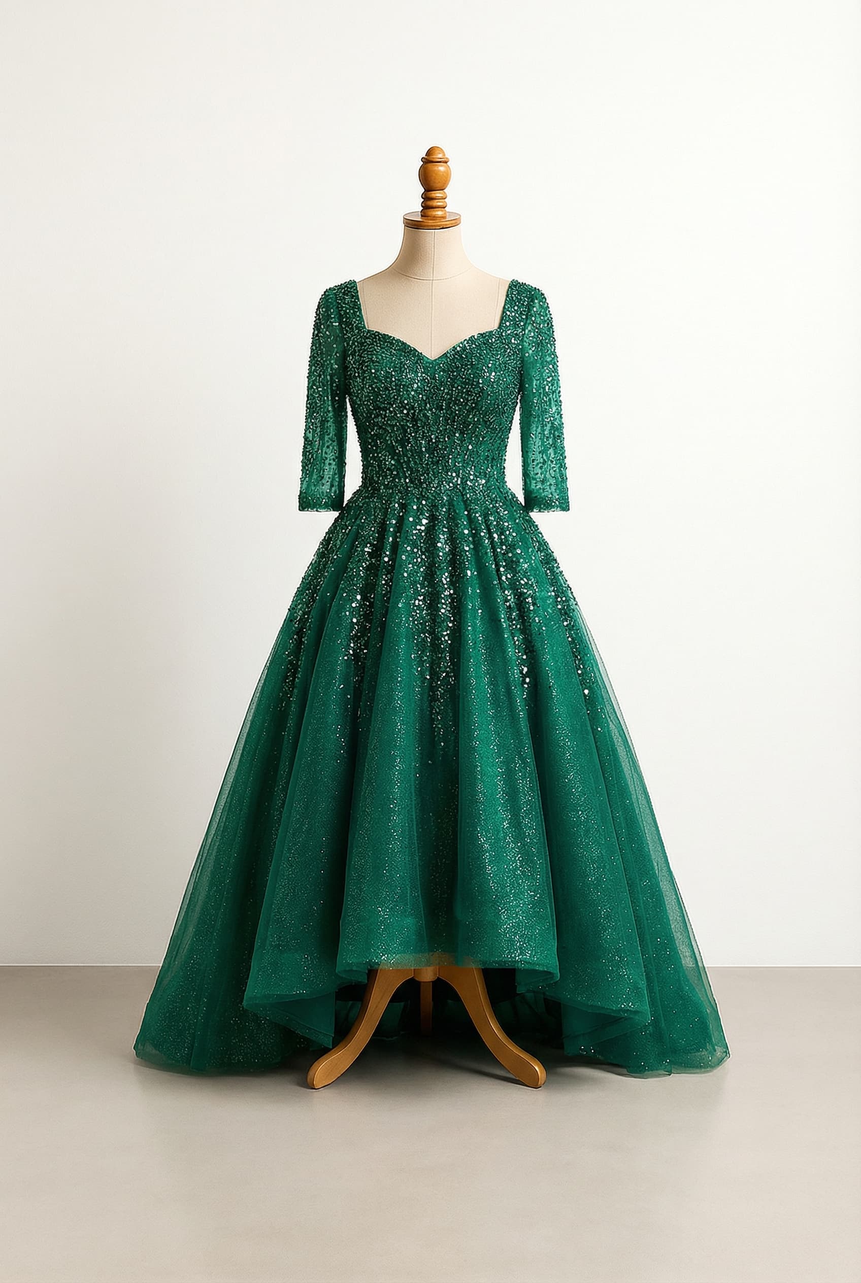 Sophisticated formal evening gown with sequin embellishments on the bodice reaching down to the skirt at the waist