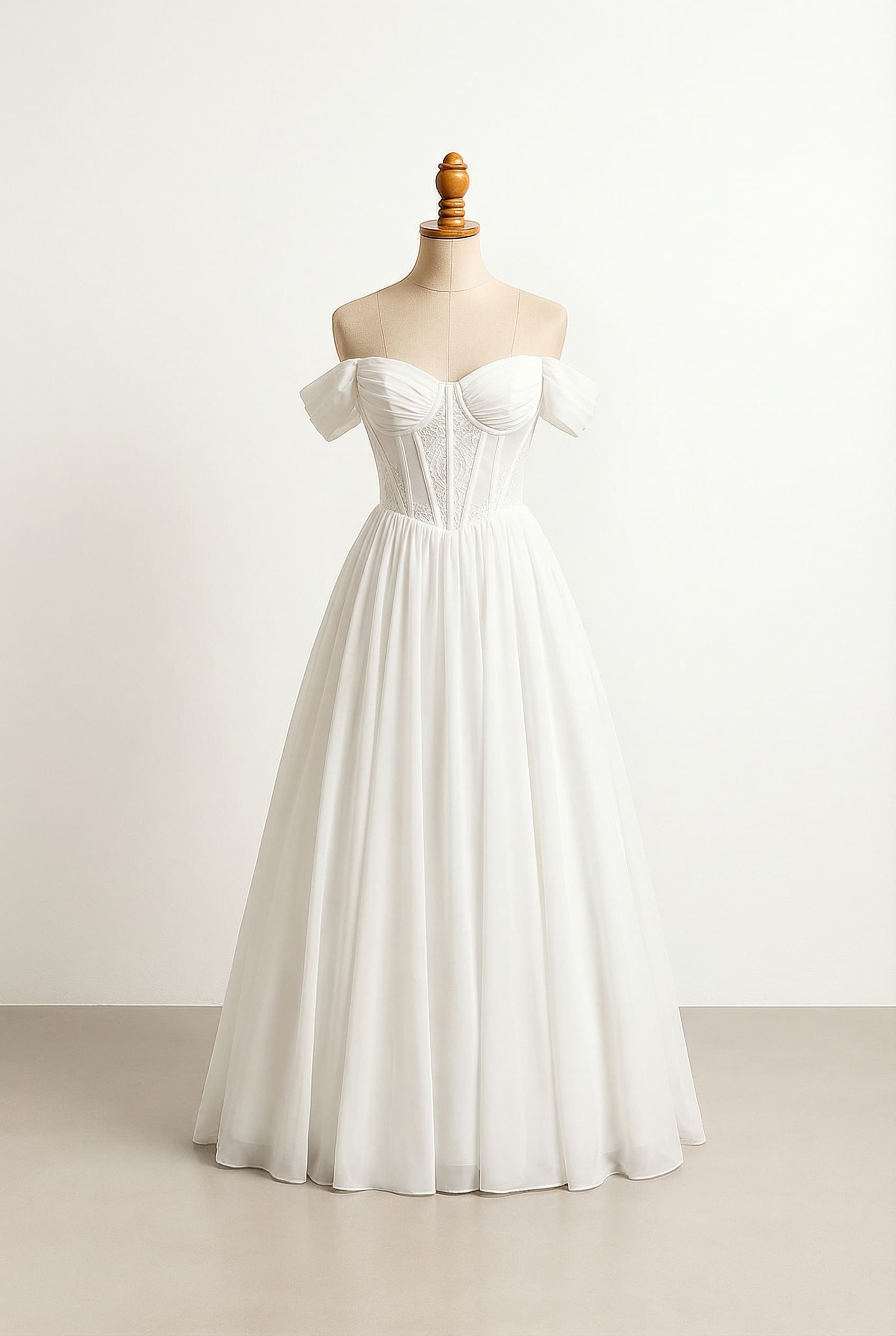 A romantic wedding dress with elegant details, an Off-the-Shoulder neckline with subtle voluminous sleeves, and a modern, elegant milkmaid-style corset bodice.