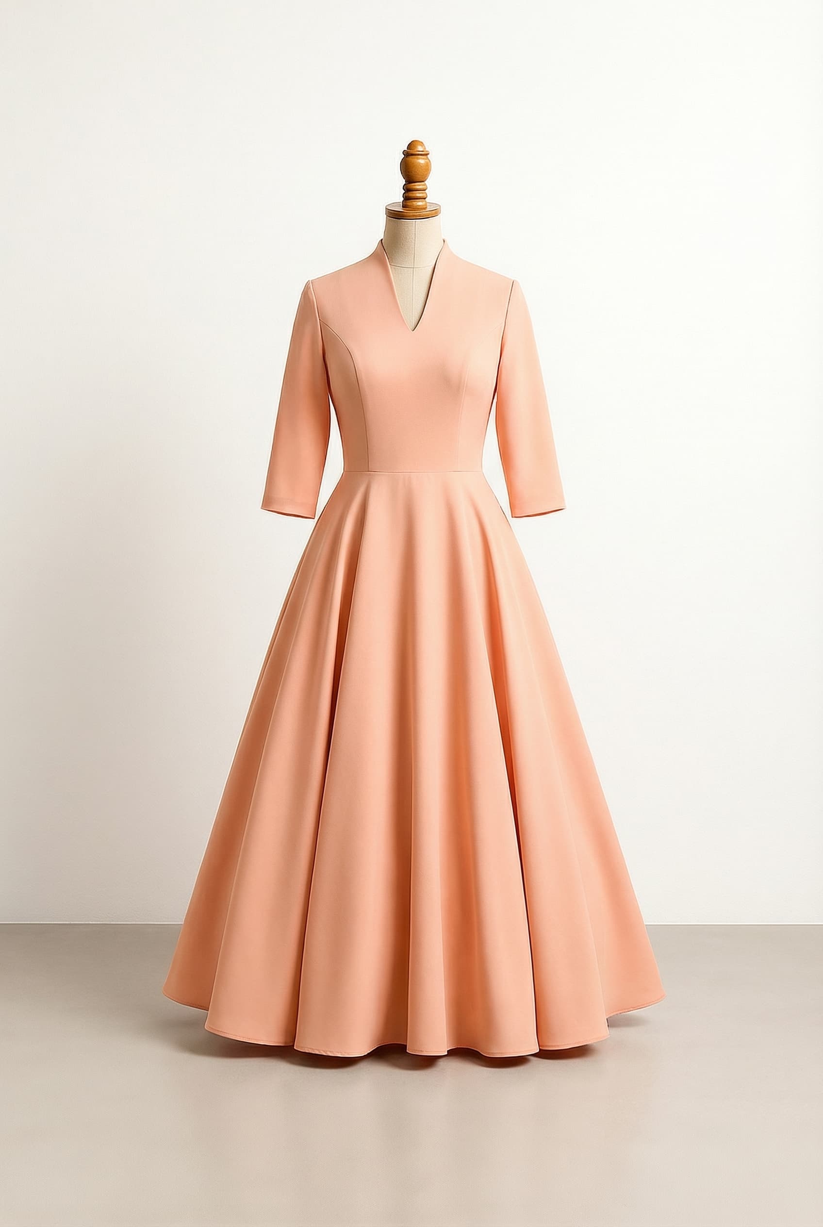 A-Line dress with a high V-neck and 34 sleeves in peach