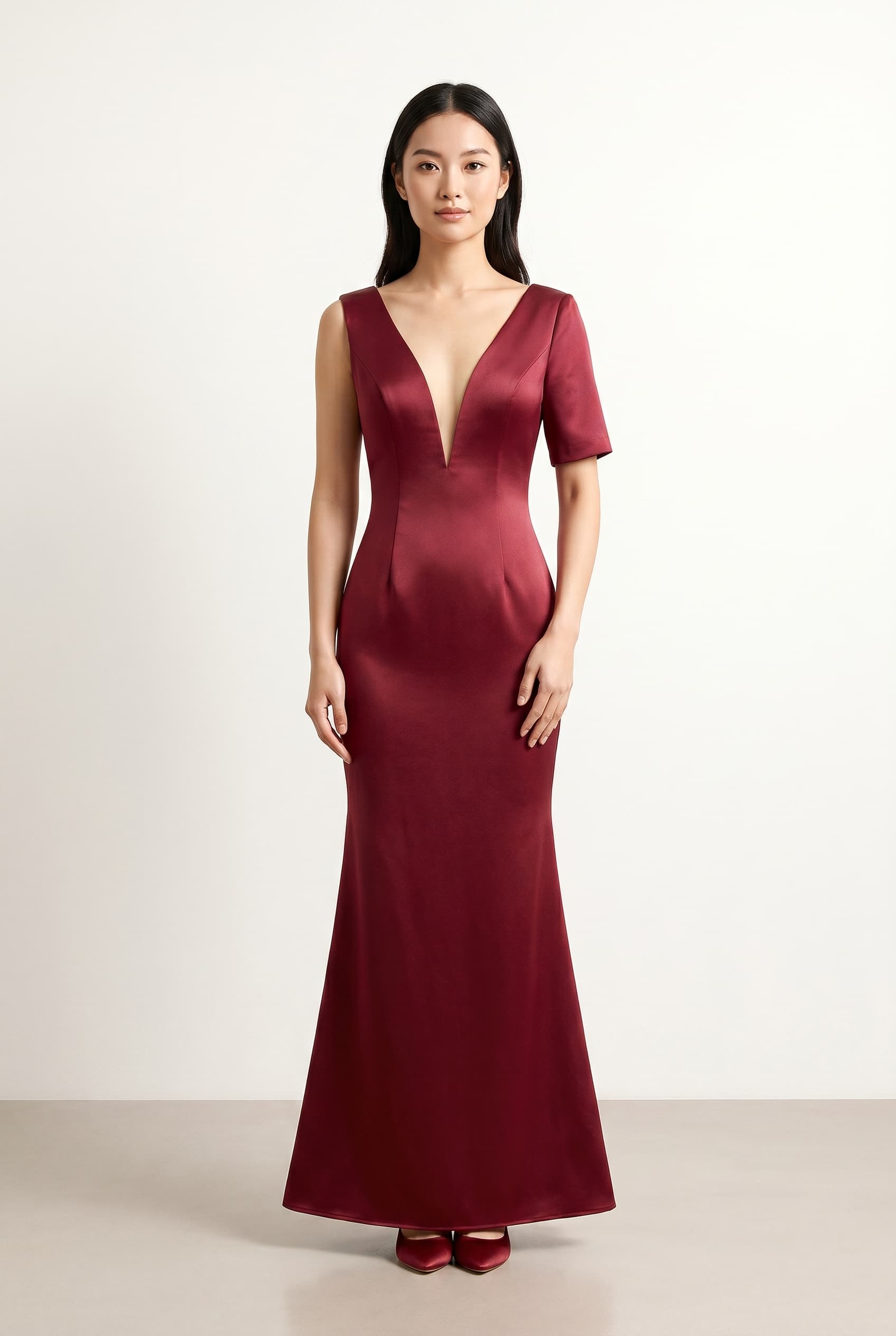 The Anastasia Navy Asymmetric Bridesmaid worn by a model