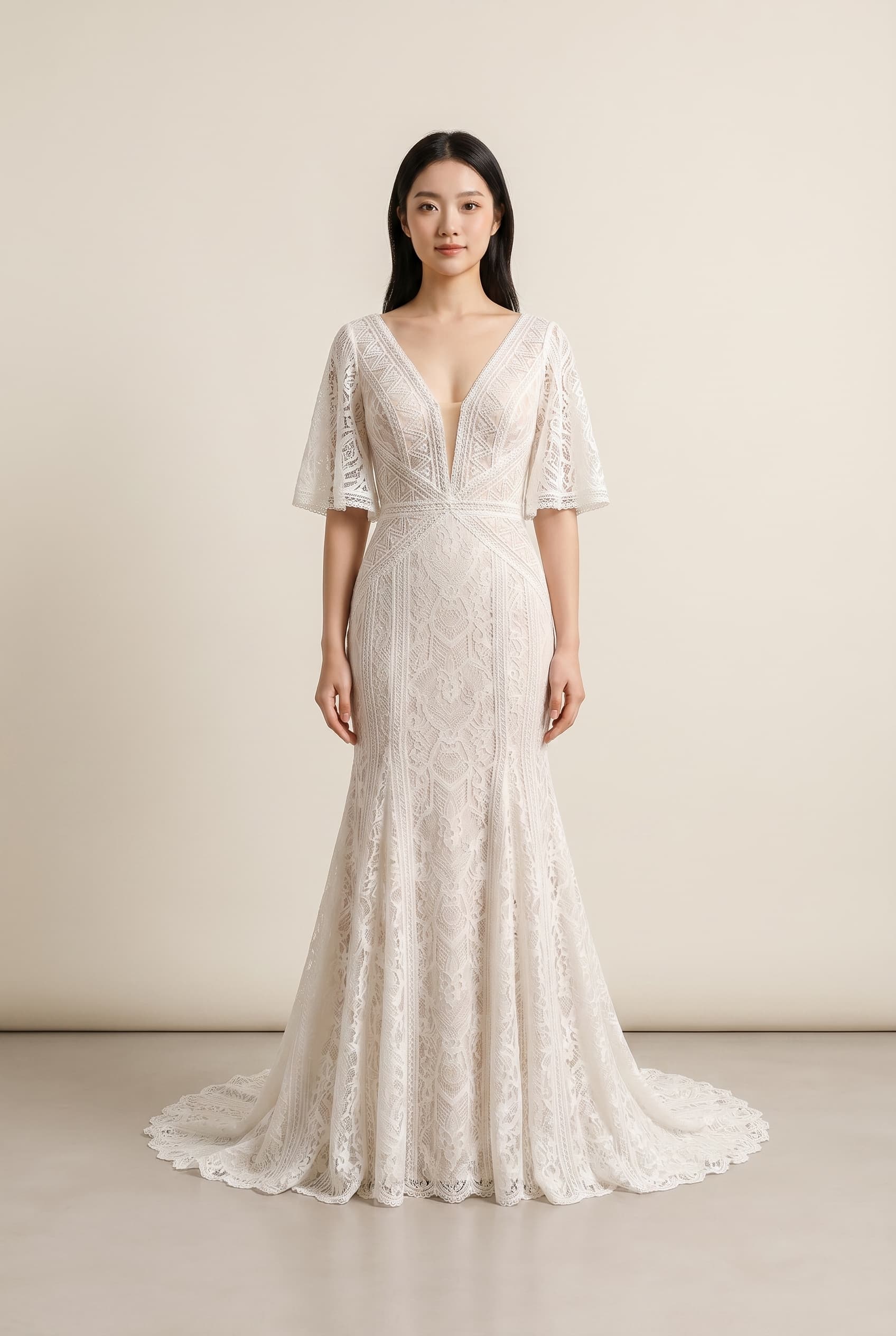 The Isabella Lace Flutter Sleeve worn by a model