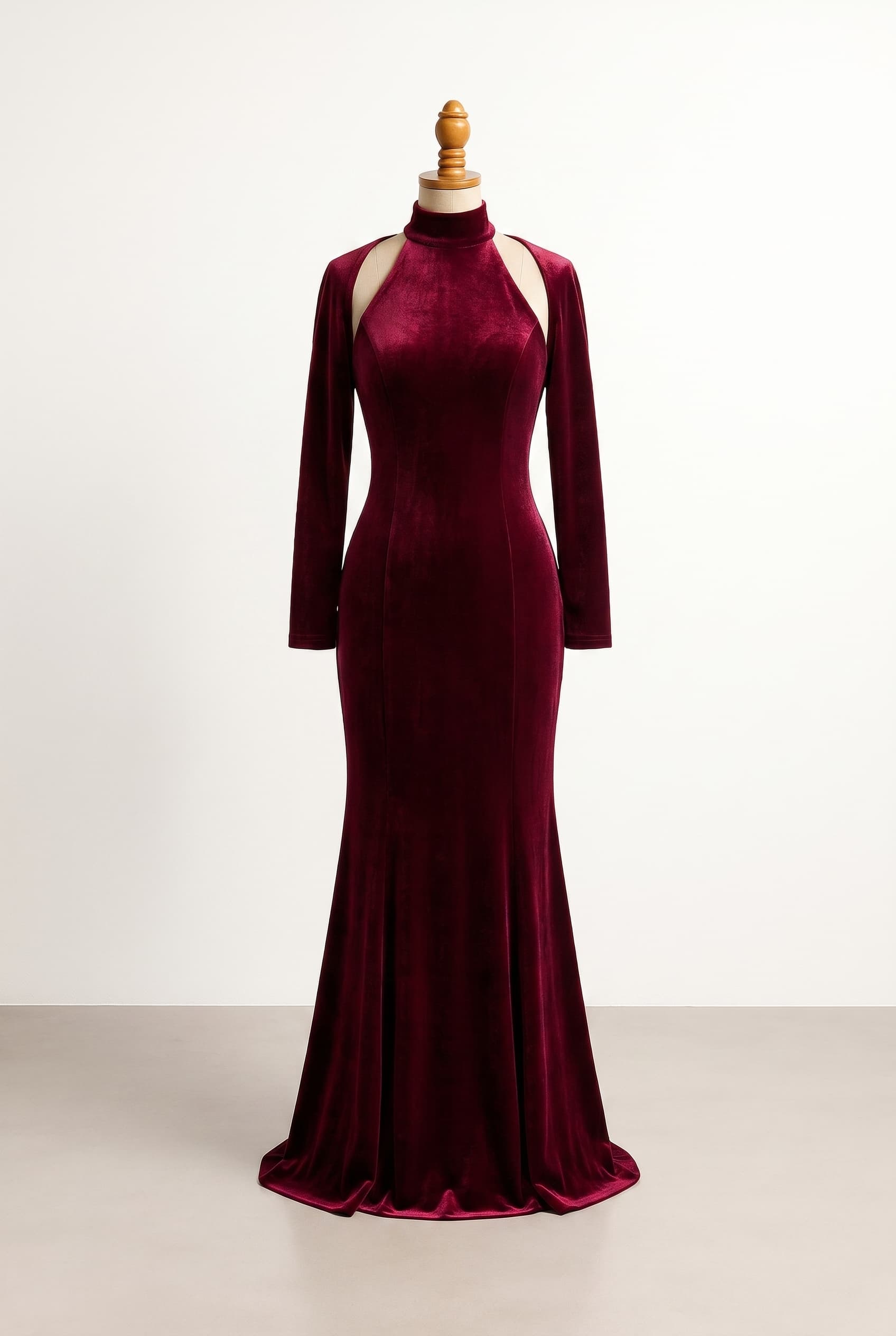 A striking, high-impact formal look designed for a dramatic entrance. The silhouette is balanced to be formal and modest but deeply captivating, utilizing heavy, luxurious velvet fabric that drapes perfectly for a sophisticated night out. Trumpet silhouette, floor-length, long sleeves, halter neckline, midnight navy color. Please provide more style options for this design.