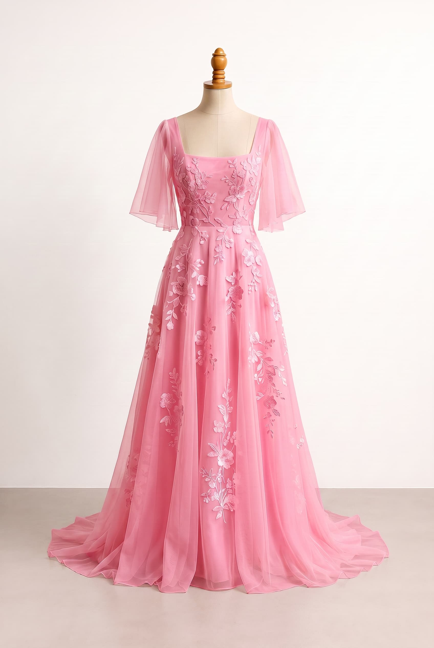 An airy, ethereal wedding dress inspired by a quiet garden, with flowing movement and botanical accents; clean front line, elegant movement, and refined restraint