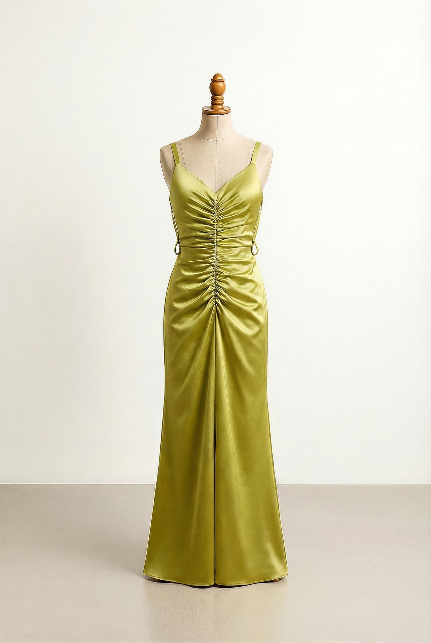 Glamorous Golden Lime Green Duchess Satin Floor-length Sheath prom dress with thin ribbon straps from the shoulders, elegant loops at the side of the waist to guide the ribbons, tighter ruching from the deeper V-neck to the crotch area, and a curvier natural waist.