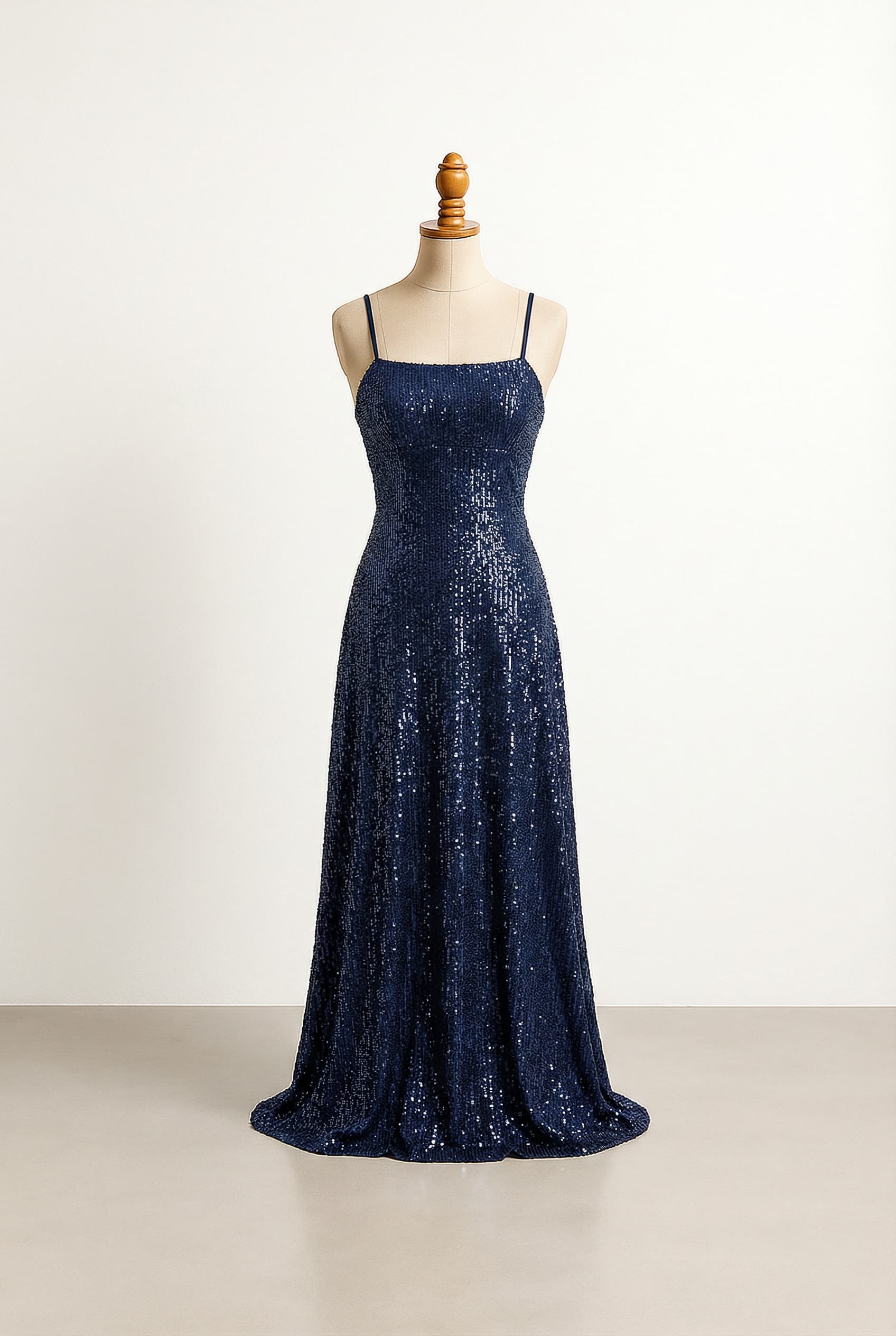 I want a balanced prom dress in empire silhouette with a straight neckline sequin embellishment and floor length and spaghetti straps. I want a balanced prom dress in empire silhouette with a straight neckline sequin embellishment and floor length and spaghetti straps with a straight back with zipper. the dress should only have sequins on the bust